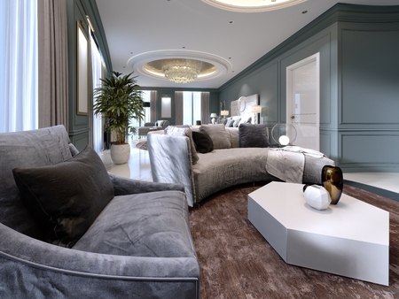 Guest room in a luxurious new hotel with open space, a bedroom and a living room lounge. 3d rendering.の写真素材