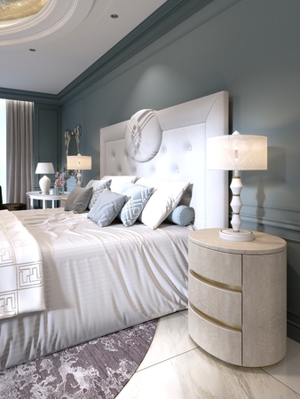 Elegant bedroom interior with large comfortable bed and sofa with dressing table. 3d renderingの写真素材