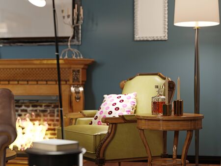 Luxurious designer chair with wooden legs and leather green leather with multi-colored pillow. Classic armchair by the wooden fireplace. 3D rendering.の写真素材