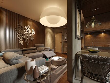 Studio apartment with a living room and kitchen area, in brown and beige color, a modern corner sofa and a large round designer chandelier in the form of a sphere, evening lighting. 3D rendering.の写真素材