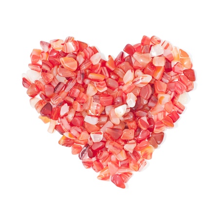 colorful stones heart sign isolated on white backgroundの写真素材