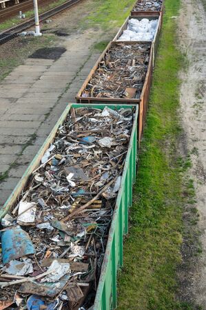 Railway wagons filled with scrap metal for metal recyclingの写真素材