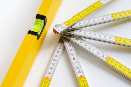 Folding rule and yellow spirit level