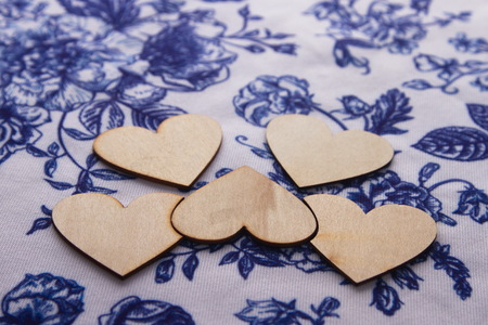 Wooden hearts on background Gzhelの写真素材