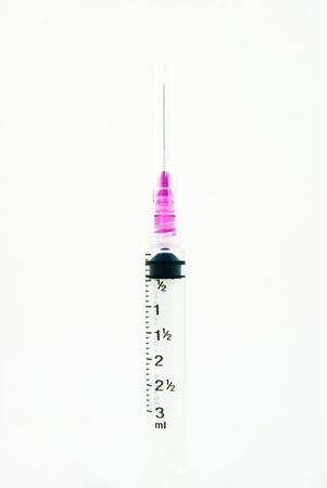 A 3ml syringe and needle isolated on a white backgroundの写真素材