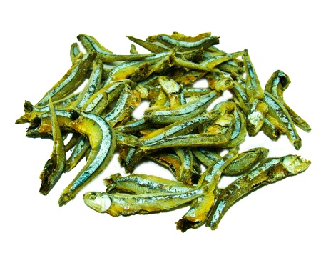 Dried fishes isolated on white の写真素材