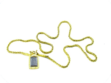 Gold chain on white backgroundの写真素材