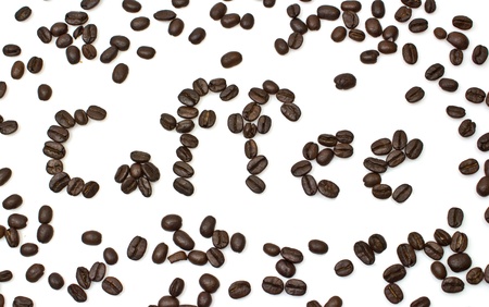 The word of coffee is made of coffee beans is isolated on a white background.の写真素材