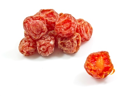 Dried plum bite  isolated on a white backgroundの写真素材