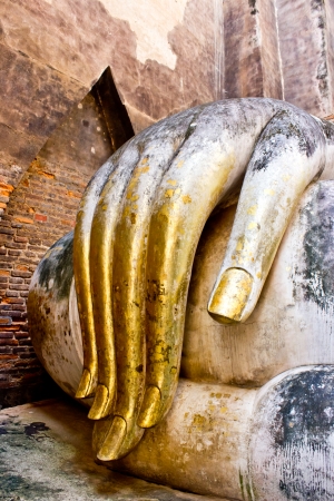 the hands of the Buddha.Sukhothai historical park, the old town of Thailand in 800 year agoの写真素材