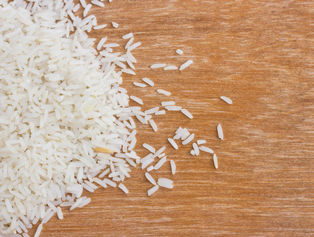 Jasmine Rice rice grian on wood の写真素材