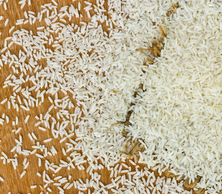 Jasmine Rice rice grian on wood の写真素材