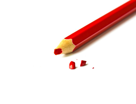 Red,Colored Pencil on White Background.(Broken pencil lead)の写真素材