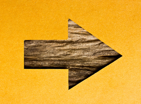 recycled paper and wood arrowの写真素材