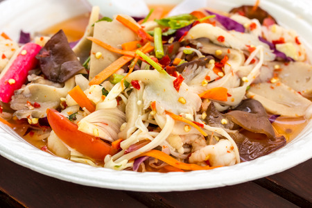 Salad with mushrooms in dishの写真素材