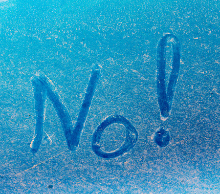 "No!" written on a dirty carの写真素材