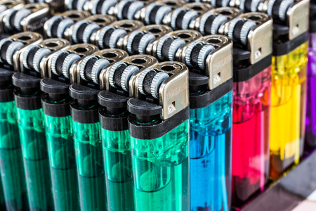 Close up image of a selection of cigarette lightersの写真素材