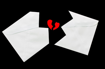 Envelope and Broken Hearts on blackの写真素材