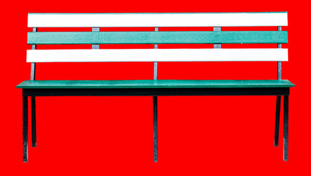 Wood long arms chair isolated on red background