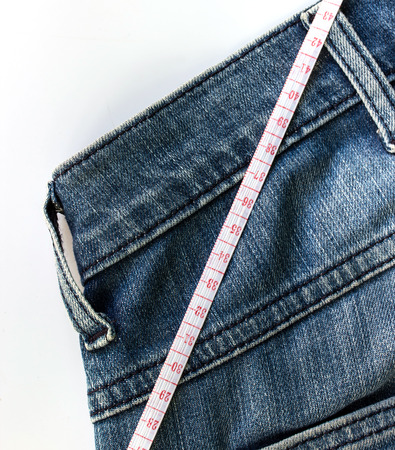 Jeans and measuring tapeの写真素材