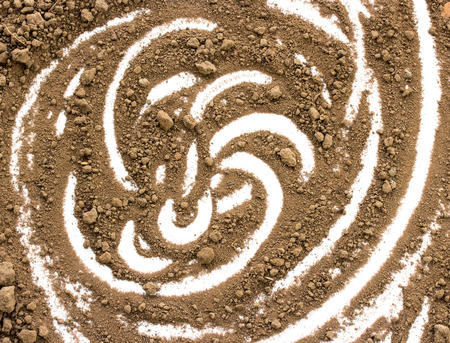 Dirty earth on white background. Natural soil textureの写真素材
