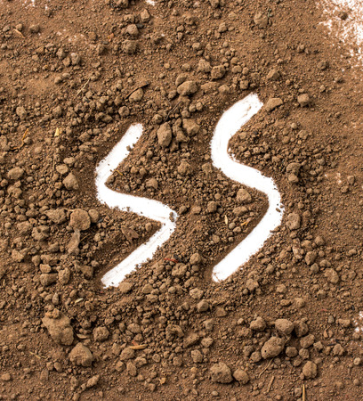 Dirty earth on white background. Natural soil textureの写真素材