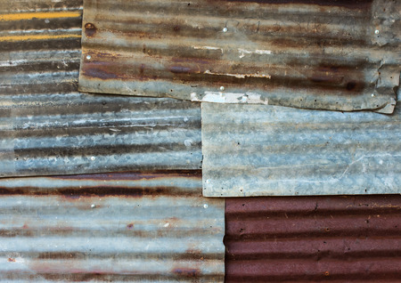 Rusty corrugated metal wallの写真素材
