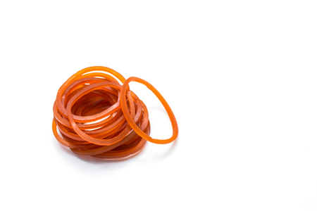 Red Rubber Band on white backgroundの写真素材