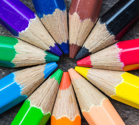 Close up Color pencils on wood background
