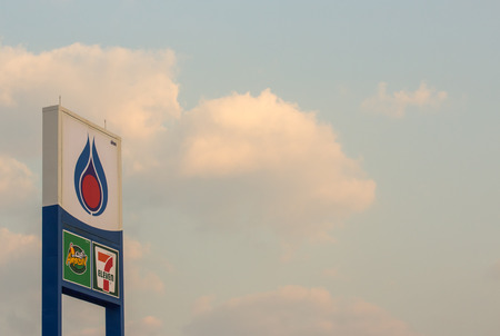 Phichit, February 6: PTT petrol station sign on blue-sky on February 6, 2016 in Phichit, Thailand. PTT is The big petrol station in Thailandのeditorial素材