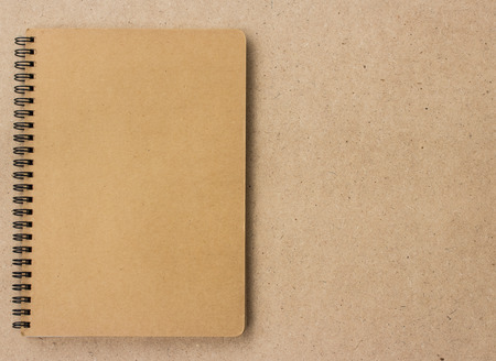 Small notepad on wood backgroundの写真素材