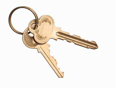 old keys on a white background.