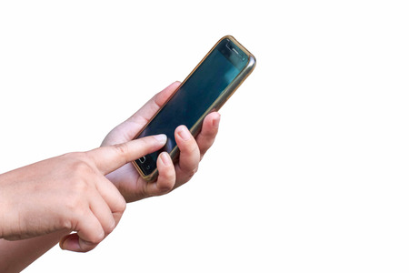 Close-up of female hands using a smart phone,isolated on whiteの写真素材