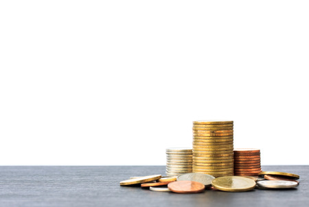 Medal tiles for a bar graph. The volume increase on black wooden floor.の写真素材
