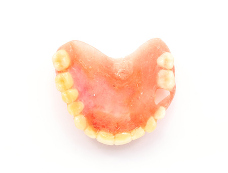 acrylic denture with metal clasps for restoring dentition.の写真素材