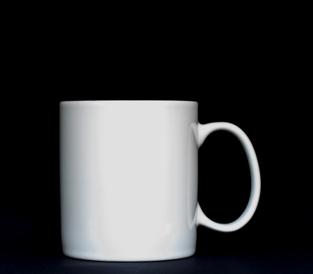 White mug on the black backgroundの写真素材