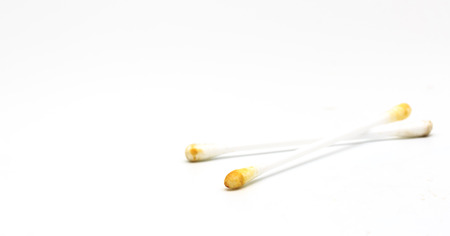 cotton swab bud on white background.の写真素材