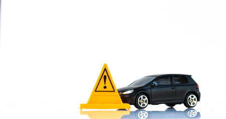 Car and warning signs on white background.の写真素材