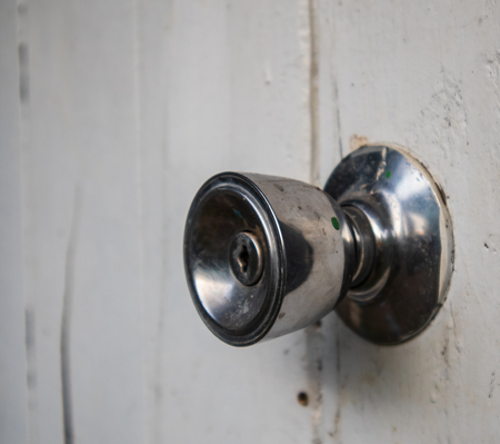 Close up of old door knob.の写真素材