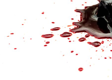 drop of blood isolated on white background, top viewの写真素材