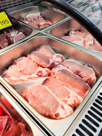 meat department shelves typical rawの写真素材