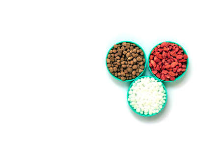 fertilizer on white background with clipping path. The concept of plant care is the need for feeding...