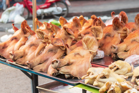 Boar's head boiled. Pork head boiled. Sell in fresh market.の写真素材