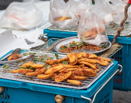 Fried bananas sold in street market. Local food of Thailand.の写真素材