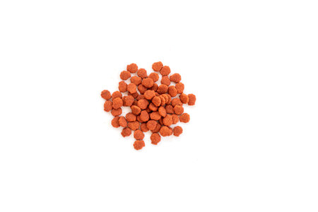 Brown cat food on a white background.の写真素材