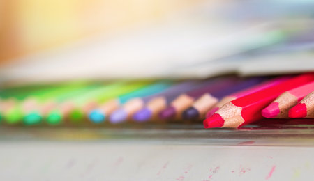 Multi-colored Pencils in Box on White Backgroundの写真素材