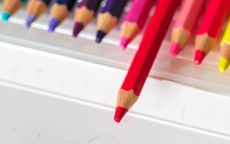 Multi-colored Pencils in Box on White Backgroundの写真素材