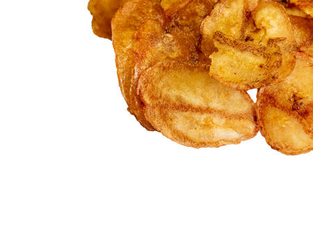 Banana slice chips on white backgroundの写真素材