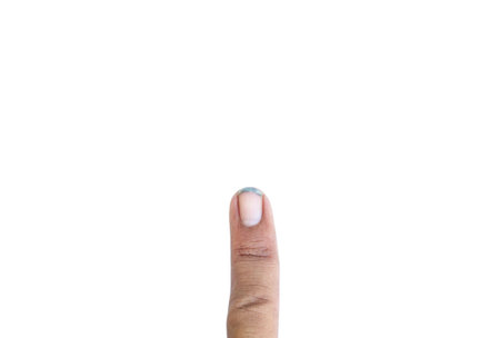 back of the fingers of the left hand of a Southeast Asian man. You will see wrinkles in the skin. The nails are a little long and a little dirty.の写真素材