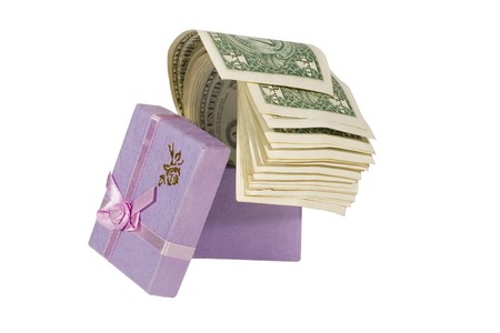 Bunch of one-dollar bills in a lilac gift box (isolated on white)の写真素材